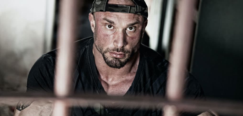inmate behind bars