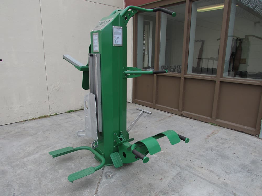 Correctional facility gym with Outdoor-Fit multigyms designed for high-security environments.